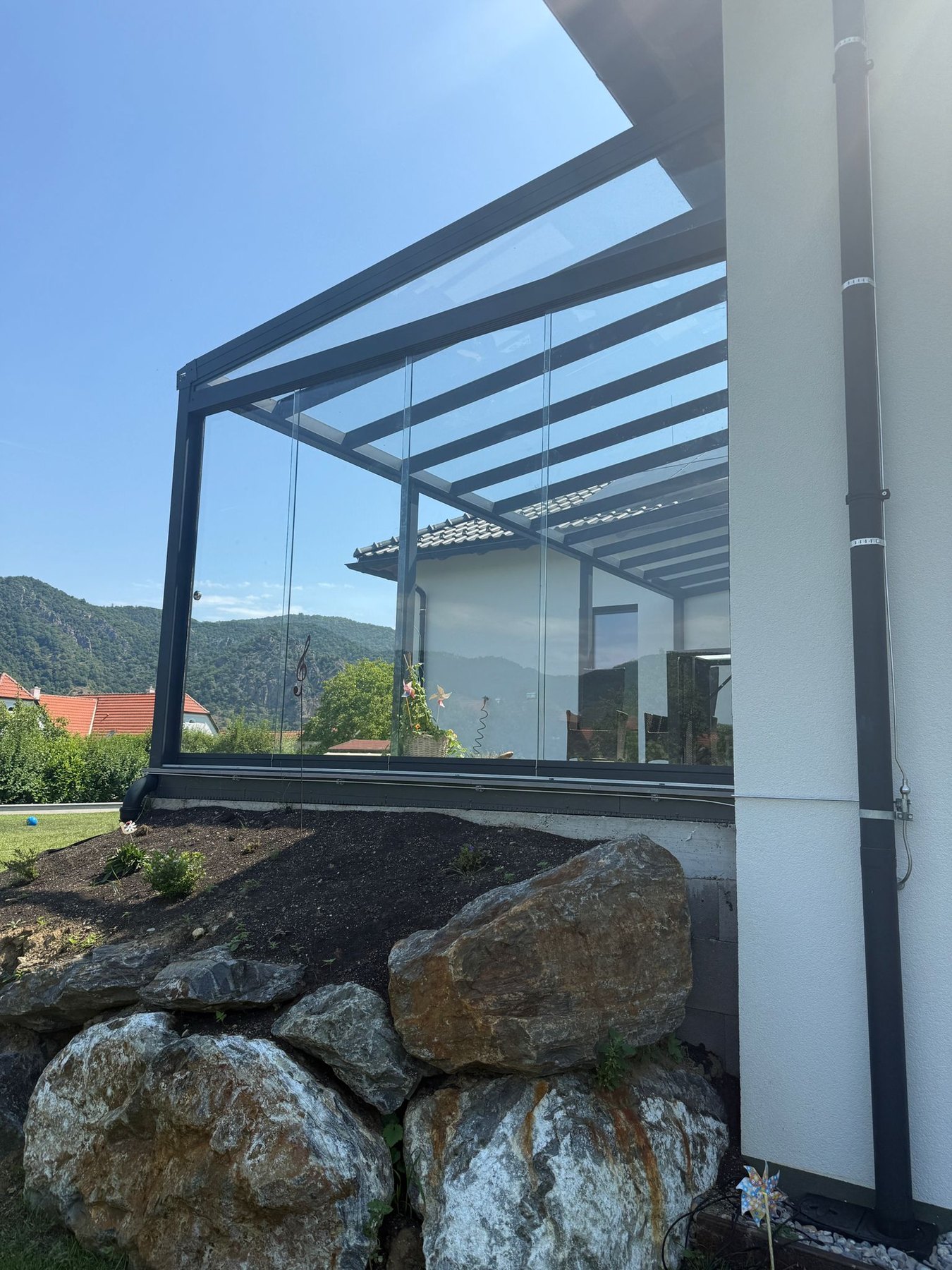 Überdachung mit Glasschiebeanlage